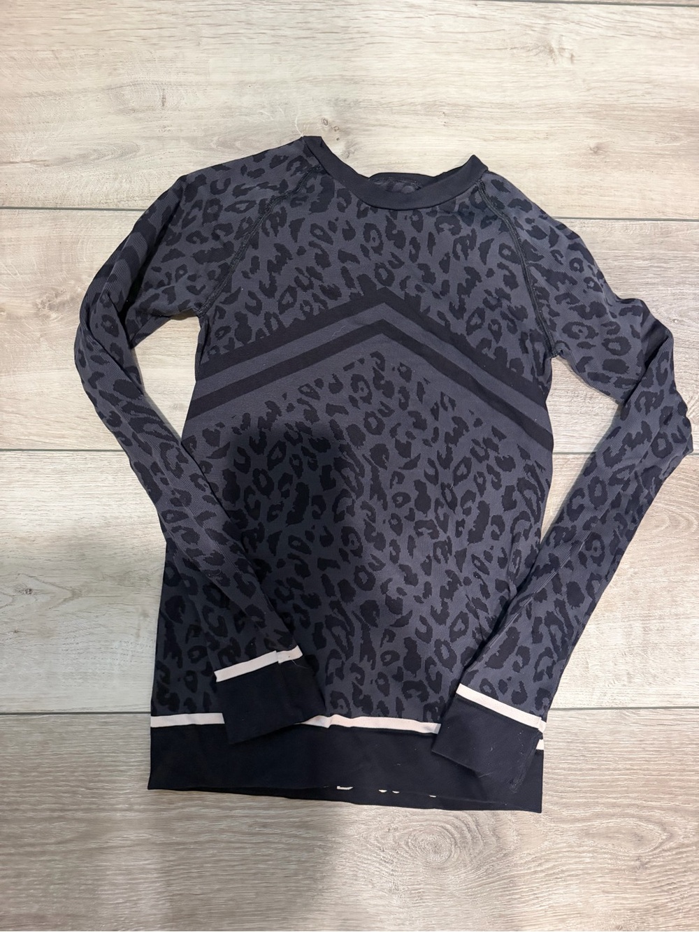 Sweaty Betty Black and Gray Leopard Long Sleeve Top
